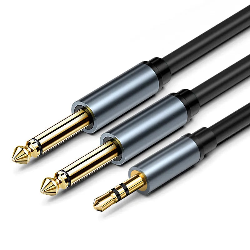 3.5mm to 6.35mm male-to-male stereo audio cable with gold-plated connectors on a black background.