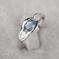 Geometric ellipse women's ring with white gold colour and inlaid zircon detailing on finger
