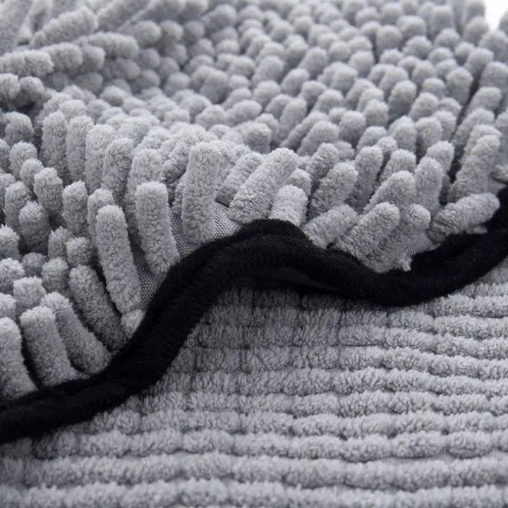 Blue pet bathrobe towel for drying dogs and cats, shown flat at 62cm by 23cm.