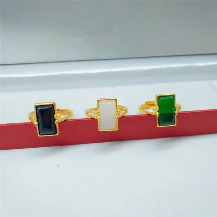 Adjustable brass gold-plated ring with long gemstone inlay in national style design