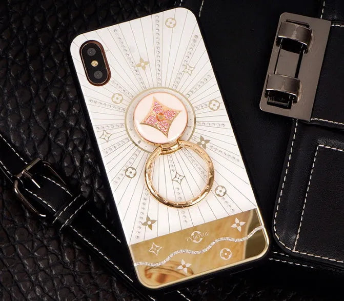 Luxury diamond and gold iPhone ring stand accessory in rose gold and white gold colours