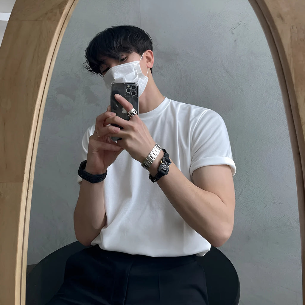 Men's slim fit cotton T-shirt in solid white colour on a hanger.