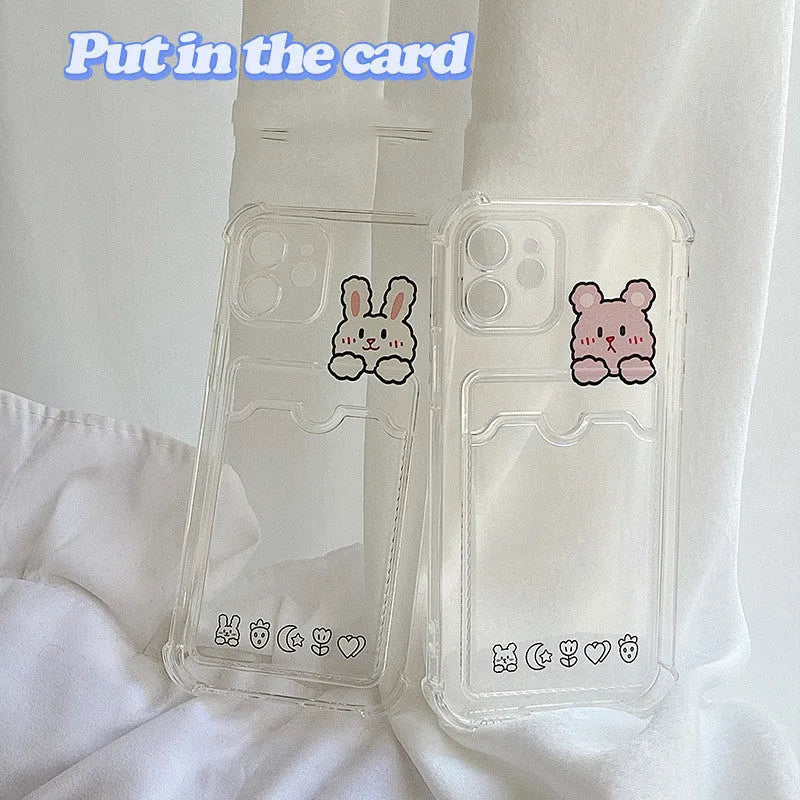 Transparent cartoon-design phone case with a card slot on the back, fitted on an iPhone.