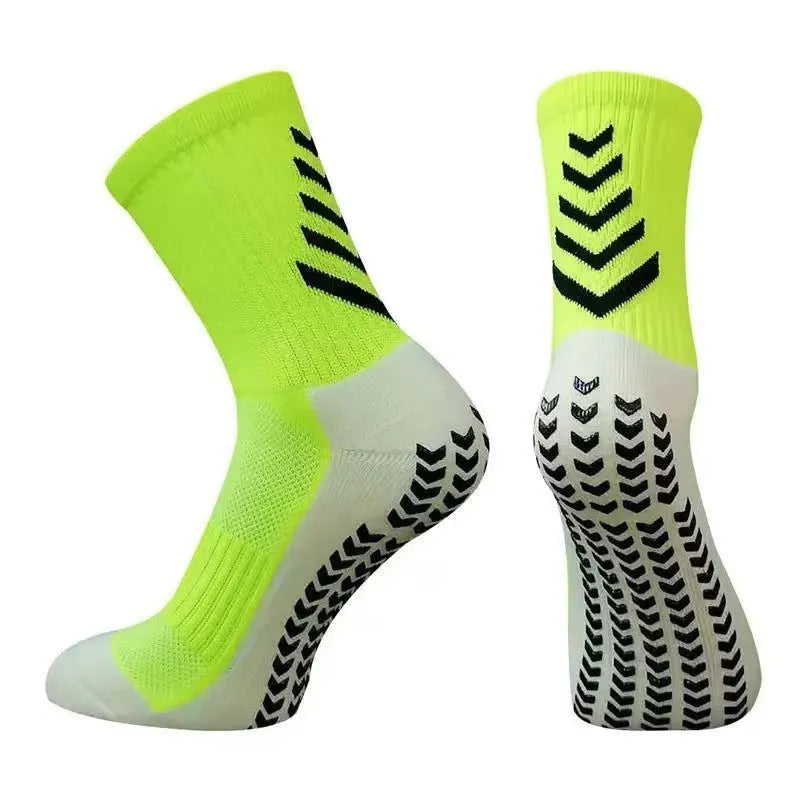 Men's mid-calf athletic socks with geometric patterns and silicone grip for running sports