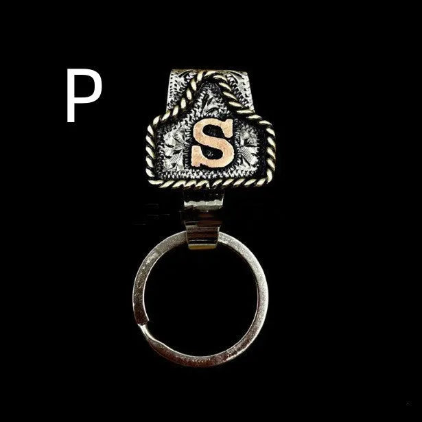 Handmade stainless steel cow tag belt key holder with engraved number plate on a split ring.