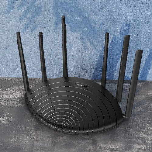 AC1900 wireless gigabit router with status display showing 254mm length on desk