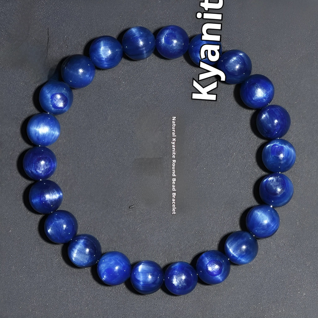 Natural blue crystal ball bracelet with geometric shape and Ruyi detail on a white background.