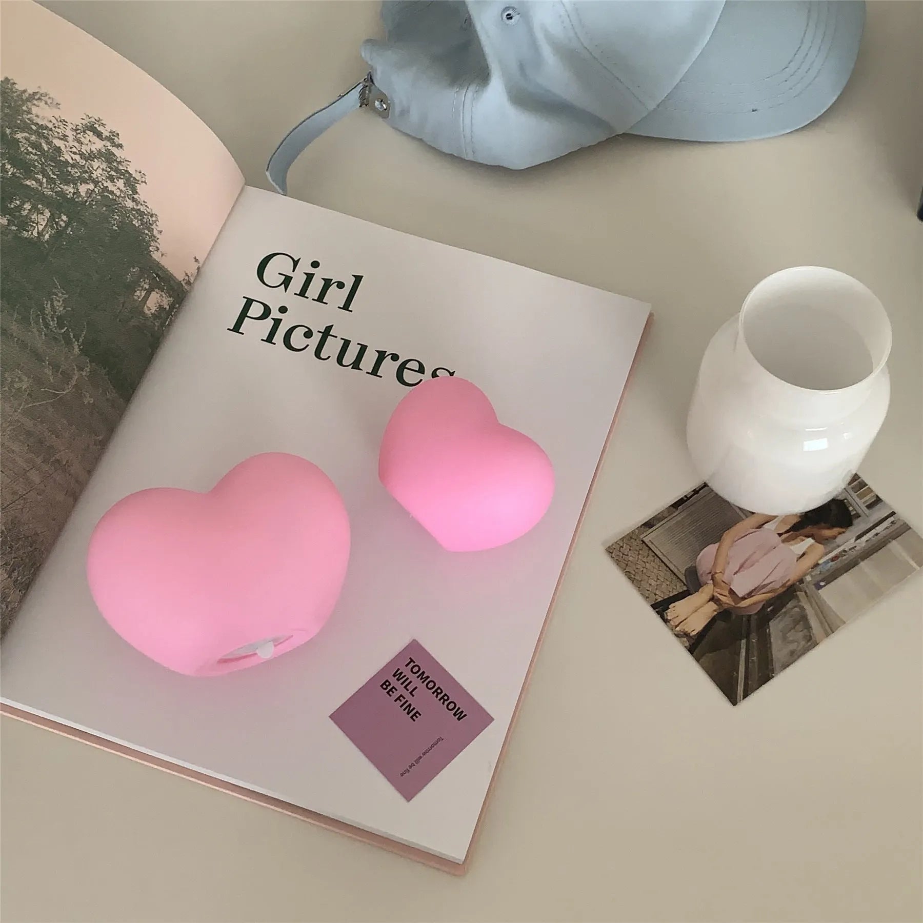 White and pink vinyl atmosphere lamps glowing warmly, shown in small and large size options.