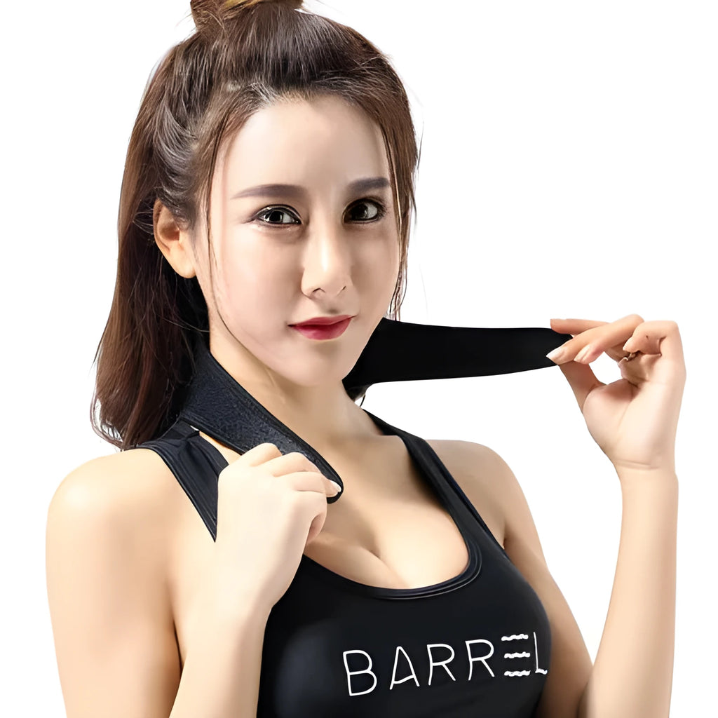 Black self-heating magnetic therapy neck guard with adjustable strap on a flat surface.