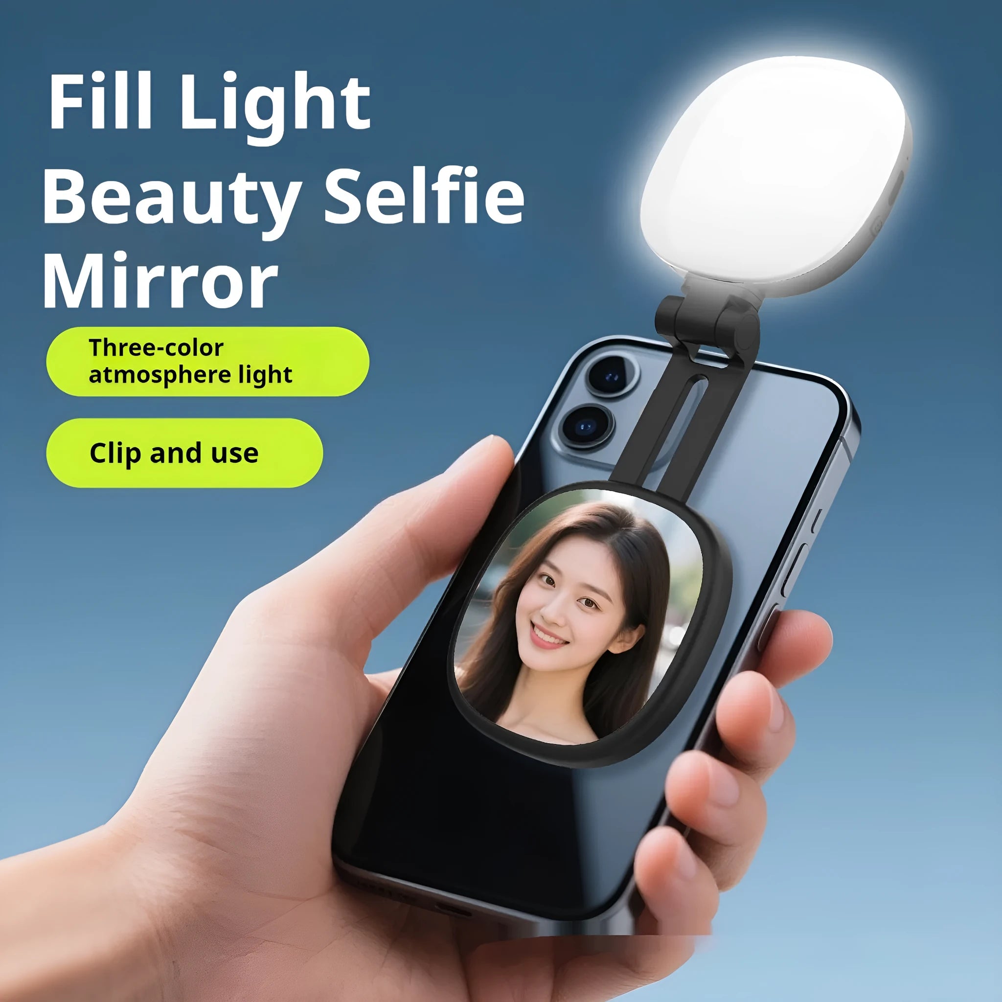 Black mini portable fill light with dial control magnetically attached to a mobile phone.