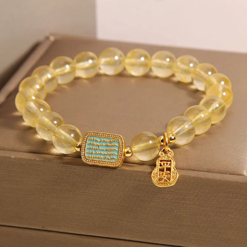Women's natural citrine crystal bracelet with yellow colour and rhinestone detailing