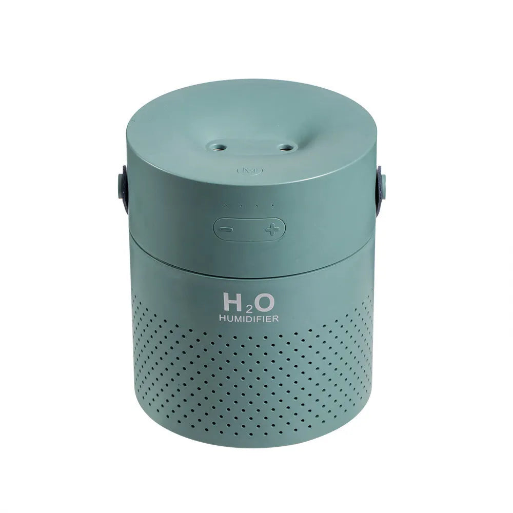Slim USB rechargeable humidifier with water tank and colour options on a bedside table.