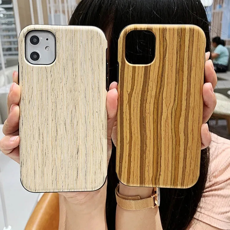 Wooden iPhone case with natural wood grain showing rosewood finish on iPhone 11 Pro
