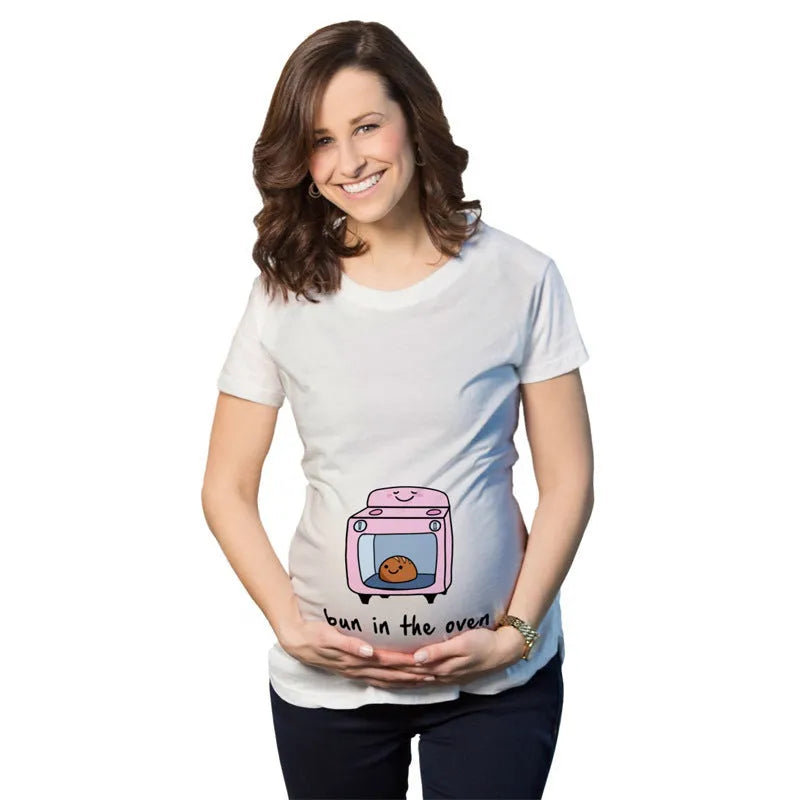 White cotton maternity t-shirt with hand print pattern, round collar, short sleeves on model