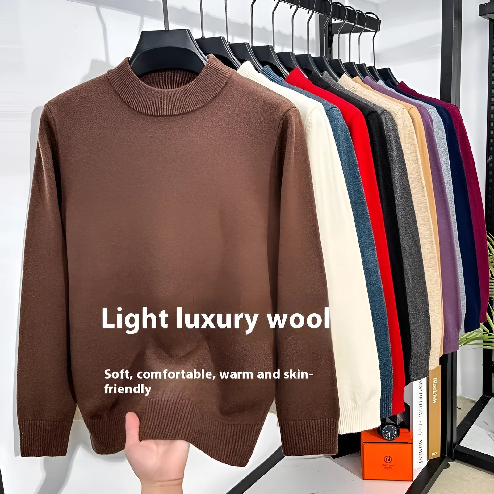 Men's solid colour fine wool half turtleneck long sleeve pullover on a hanger