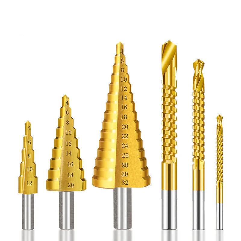 High-speed steel cone step drill bits and a centre punch set on a workshop bench