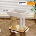 Pine wood cat nest with two columns holding chamfered balls and a central resting platform.