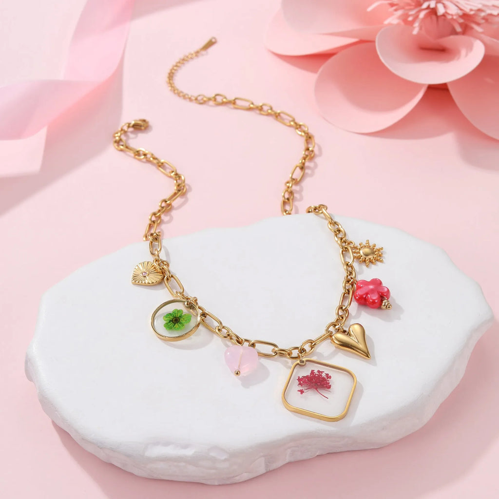 Women's stainless steel 18K gold plated epoxy flower pendant necklace with geometric shape and regular chain