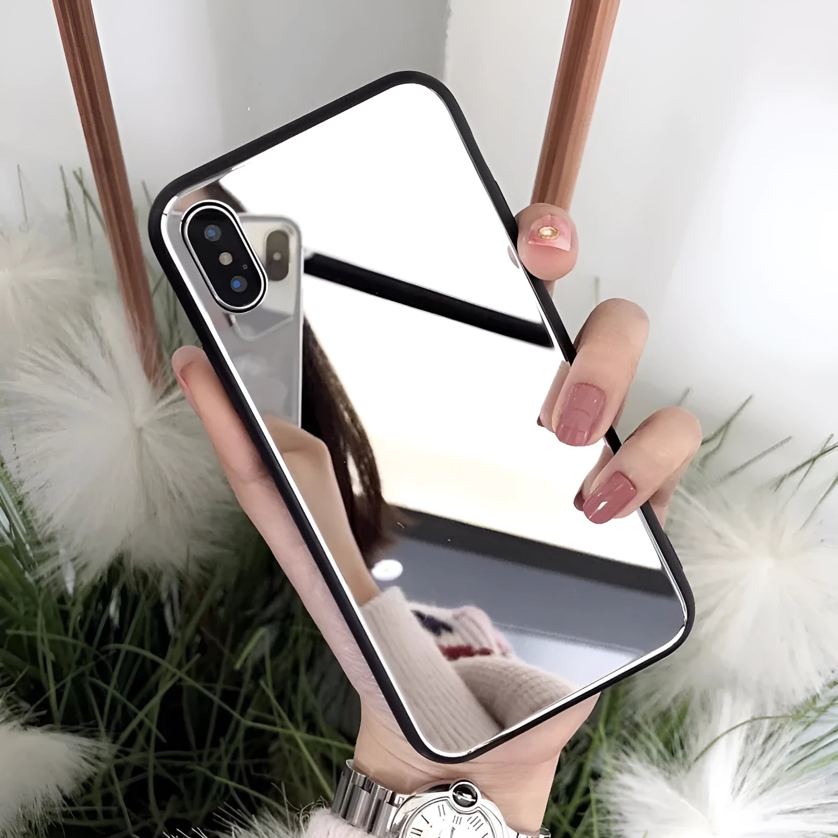 Black iPhone case with a built-in mirror on the back, compatible with iPhone X, 7, and 8 Plus models.