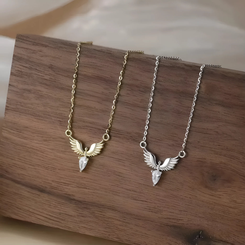 Sterling silver eagle pendant necklace on an adjustable O-ring chain with white gold or yellow gold finish.