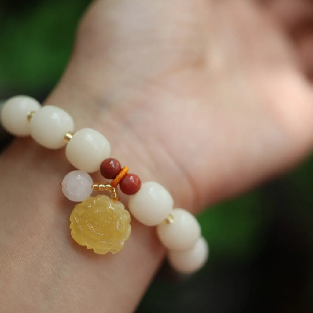 Gradient white jade Bodhi root bracelet with natural beeswax Lotus pendant on wrist