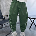 Men's loose fit cropped sports trousers in bamboo fibre, shown in Army Green colour.