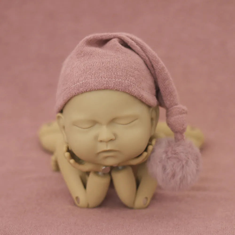 Hand-woven yarn baby photography hat in conical style, available in twelve colour options