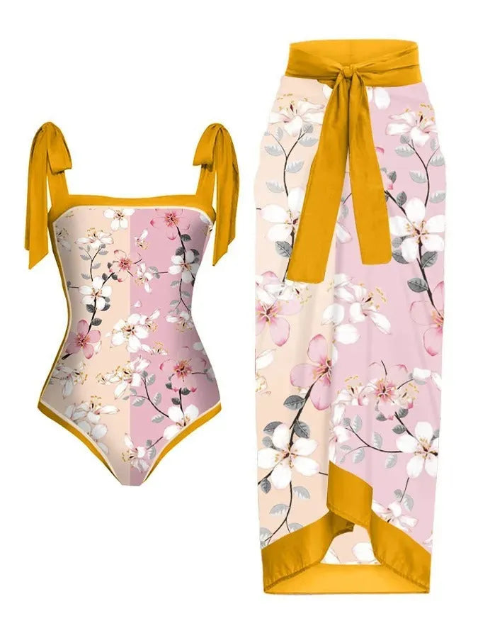 Women's two-piece floral printed polyester swimsuit with matching hip skirt in conservative style