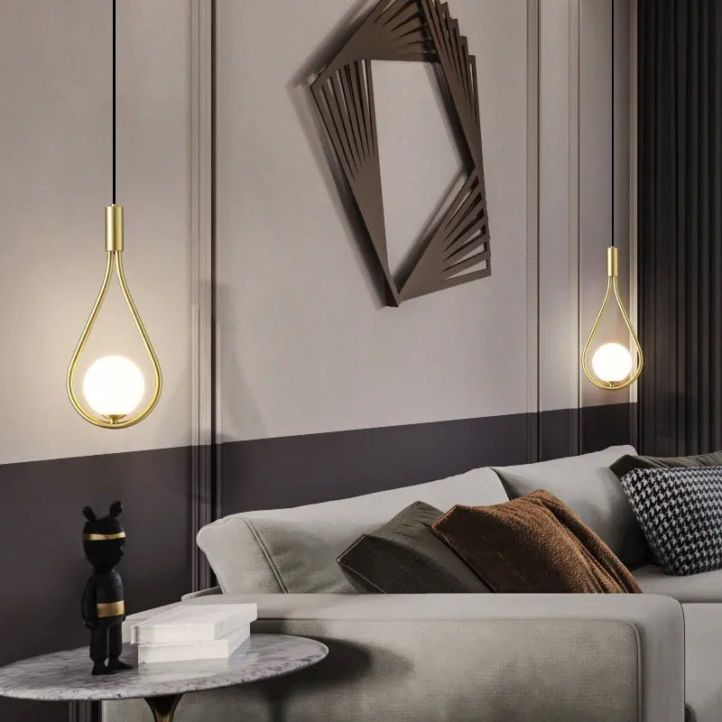 Modern minimalist bedside chandelier lamp for bedrooms with copper or black and gold finishes