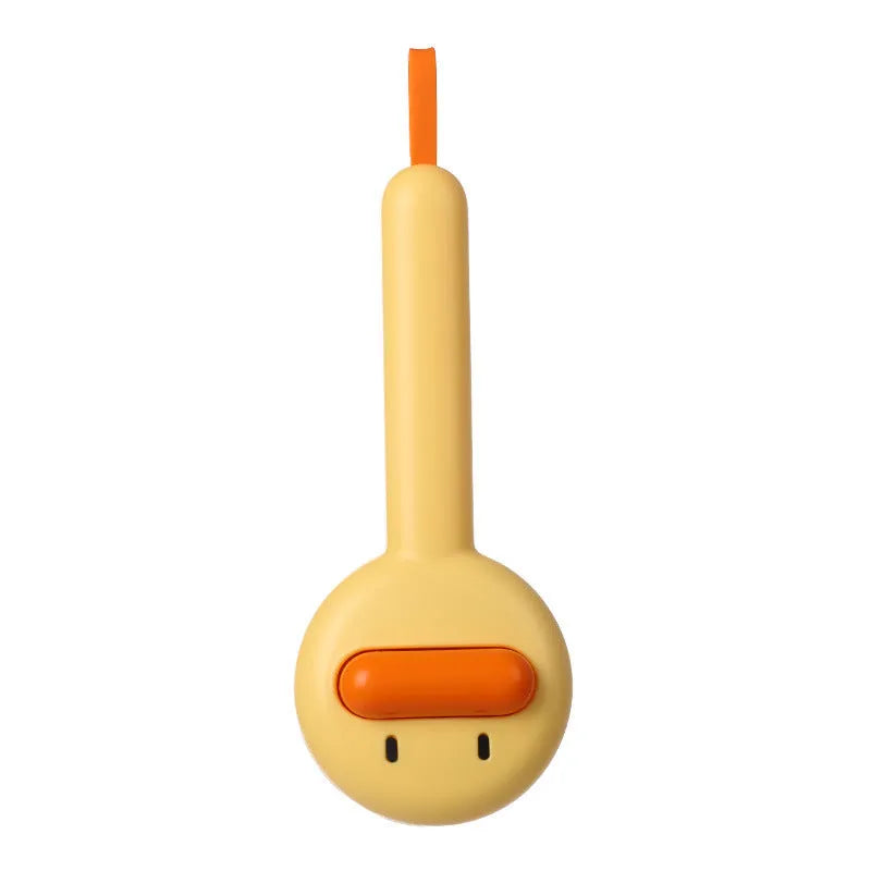 Small yellow plastic duck-shaped pet grooming comb with needle bristles.