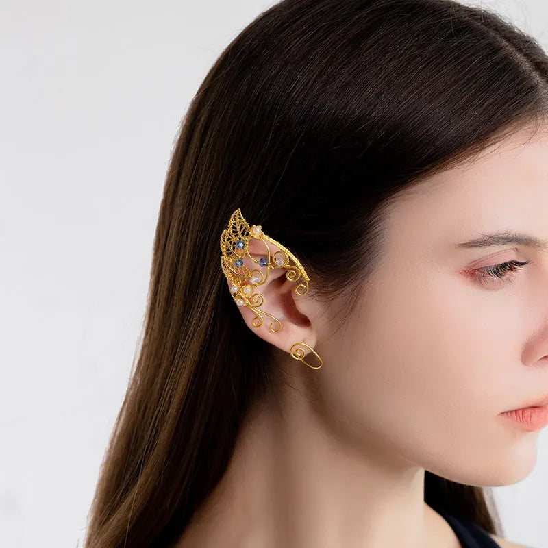 Handmade leaf shaped elf ear clip in gold pair with electroplated finish on woman