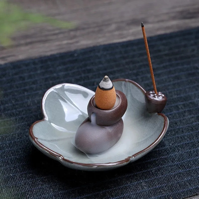 Square ceramic reverse flow incense burner with lotus and plum blossom decorative motifs