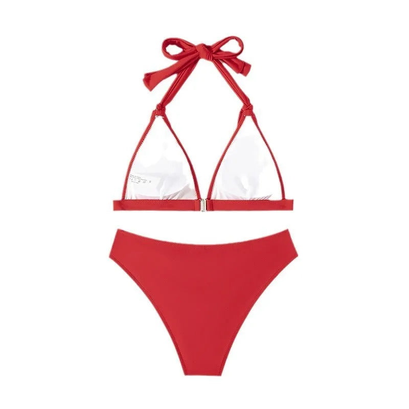 Red women's halterneck bikini with lace-up front and high-leg briefs