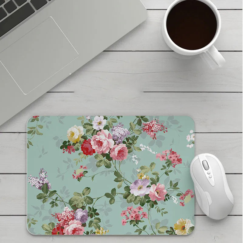Custom cartoon mouse pad with thickening, showing example artwork on non-slip rubber and cloth base.