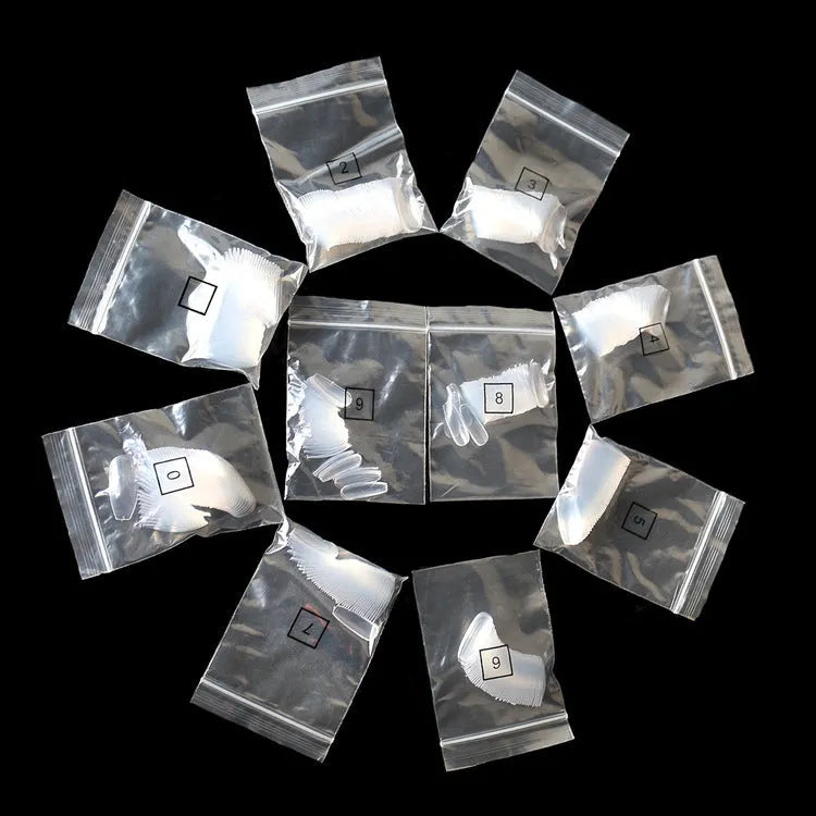 500-piece set of clear and natural coloured ABS false nails in 10 different sizes