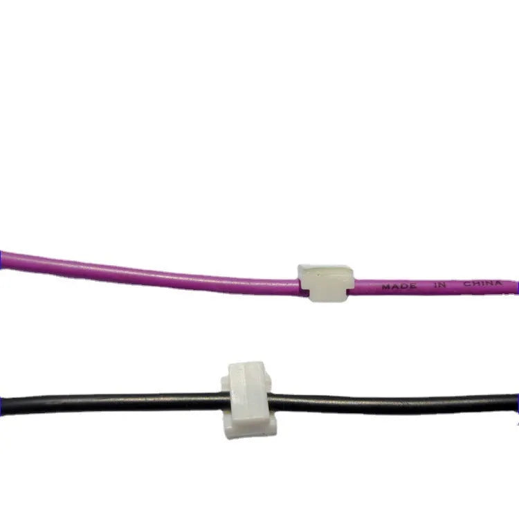 Black automotive cable management clips for car stereo and LED wiring organisation