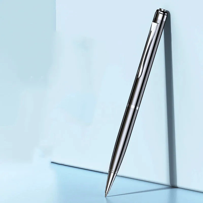 Black pen-shaped digital voice recorder with zinc alloy casing shown next to its accessories.