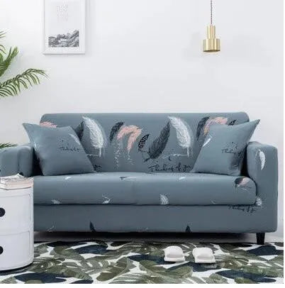 Geometric patterned stretch sofa slipcover fitted on a modern two-seater sofa.