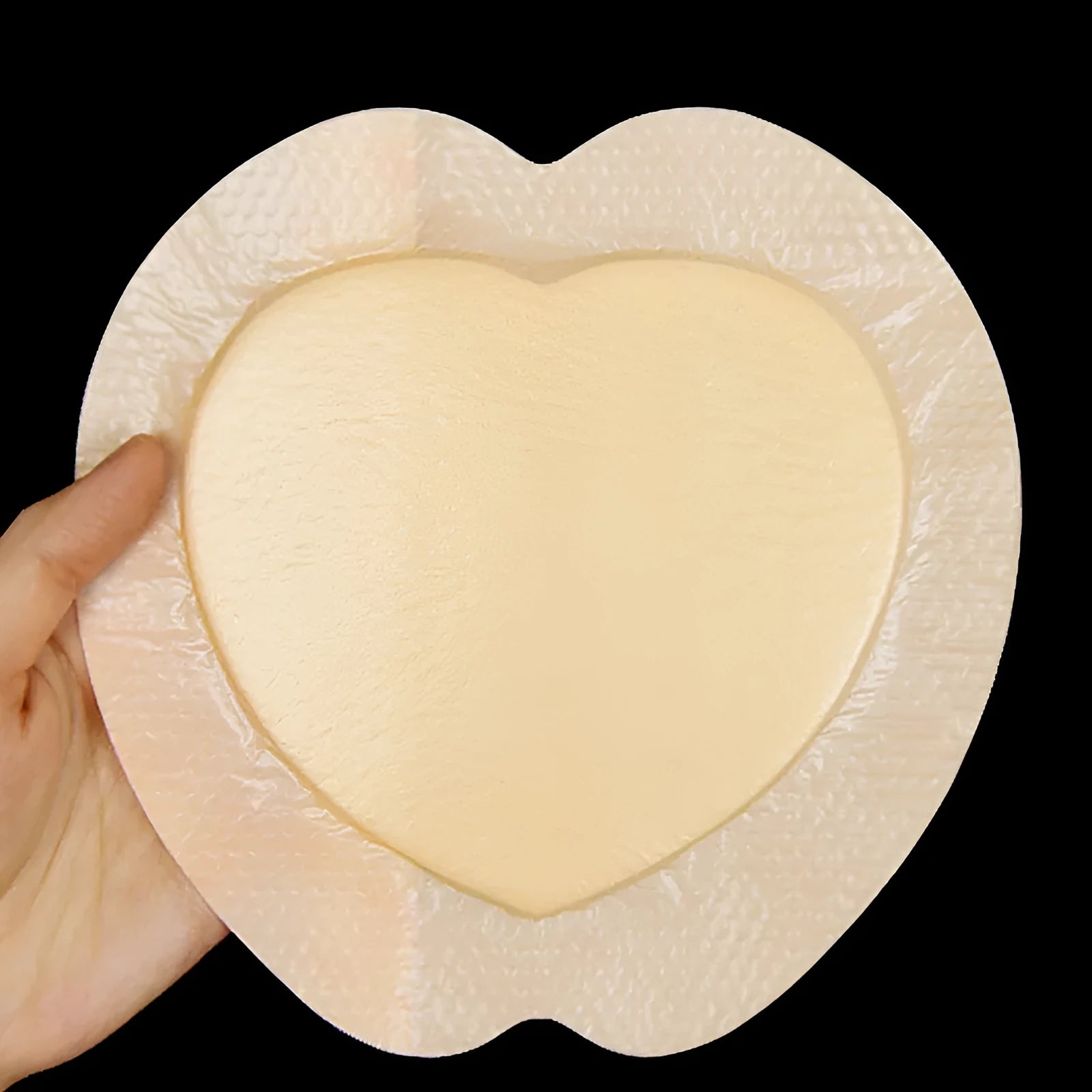 Skin-coloured silicone foam medical dressing for bedsore prevention and pressure relief