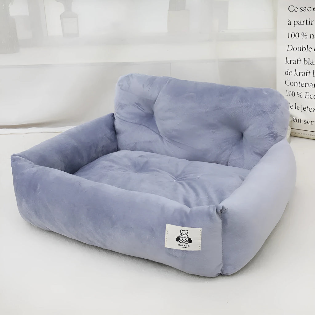 Blue plaid and grey cloth car-mounted pet travel nests shown in small and large sizes