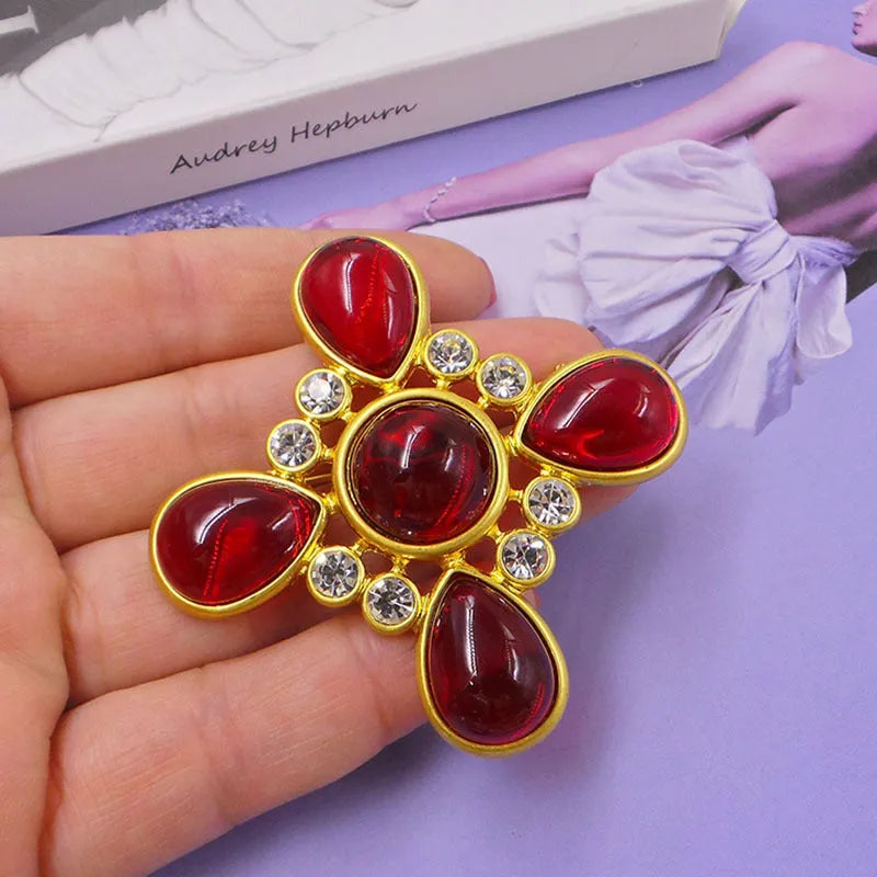 A vintage-style medieval baroque crystal brooch made from zinc alloy, shown in one of eight available colour options.