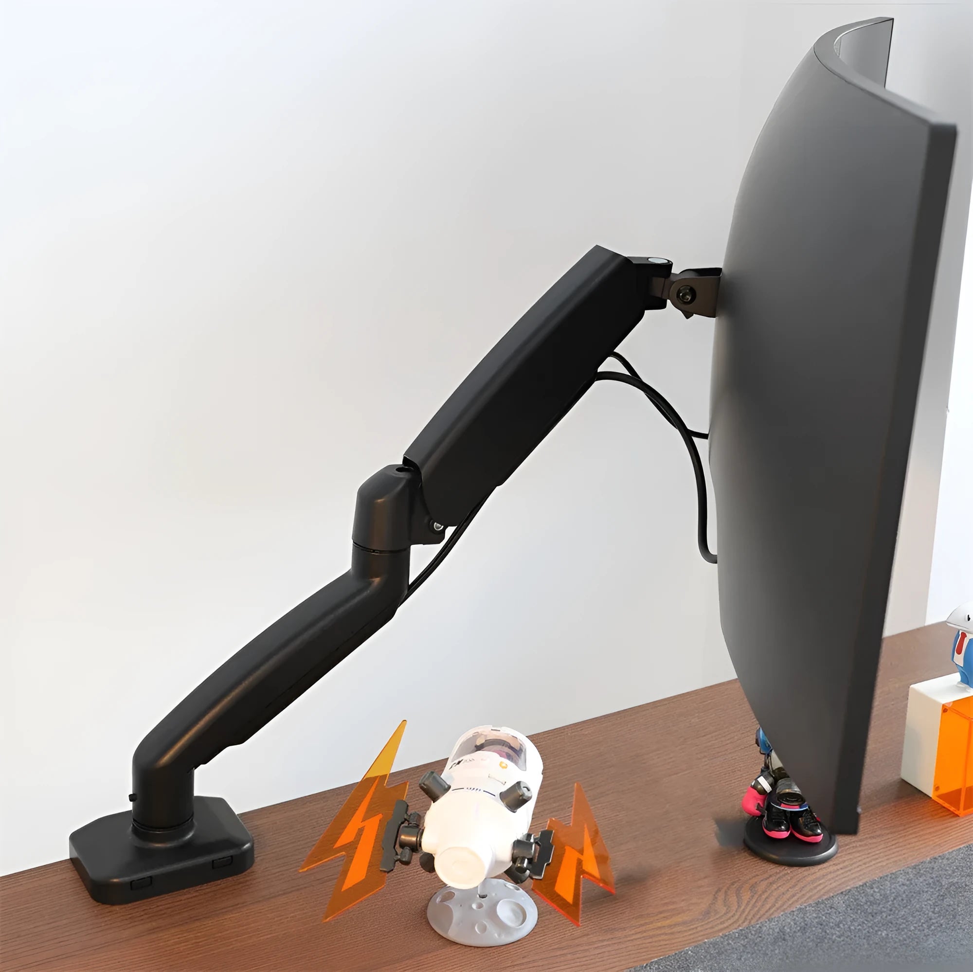 Black rotating telescopic LCD screen bracket on table with adjustable height and rotation features