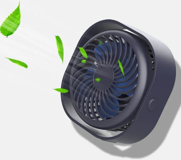 USB desk fan with rotating head in modern alarm clock design on desk