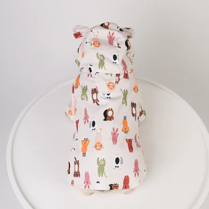 Beige dog raincoat with cartoon animal pattern waterproof PU material