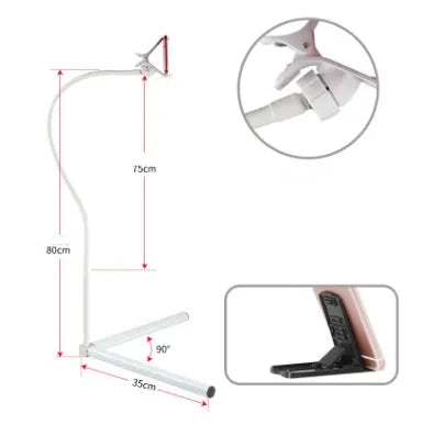 Black bedside mobile phone bracket with universal holder attached to bed frame for hands-free viewing