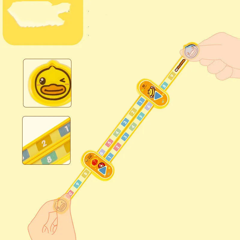 Yellow plastic children's digital resolution ruler with cartoon graphics, showing centimetre and millimetre scales.