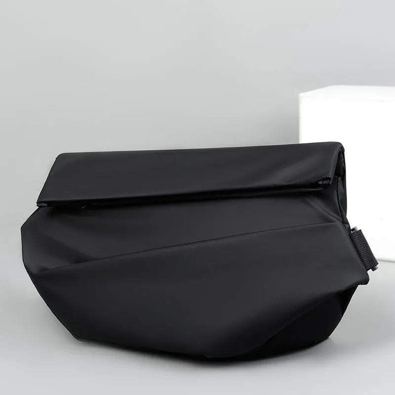 Men's grey medium crossbody sling bag showing internal phone and document compartments