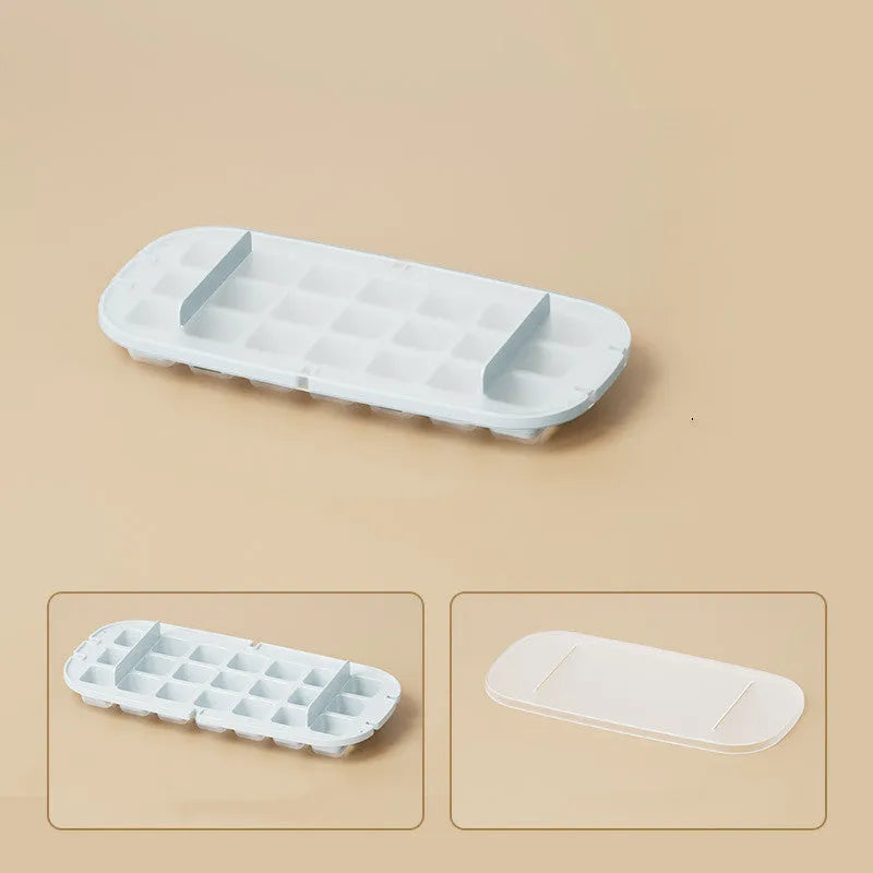 High-capacity plastic ice cube tray with grid pattern and ice shovel, shown in blue colour.