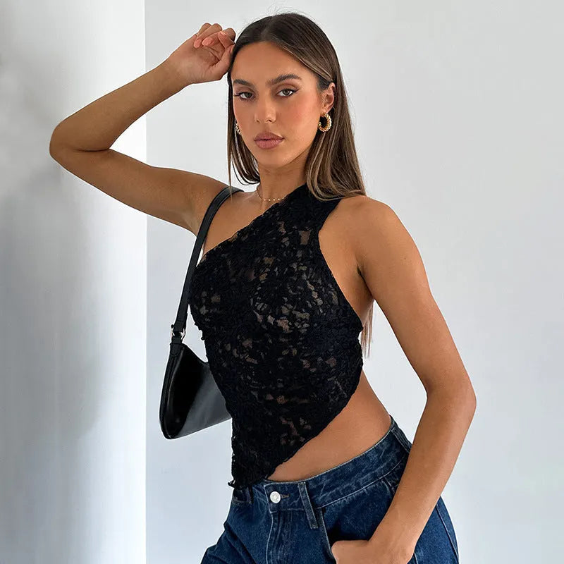 Women's sleeveless lace backless top with asymmetrical neckline in a solid colour.