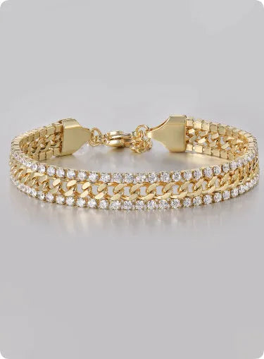 Gold titanium steel tennis bracelet with artificial gemstone inlay on wrist